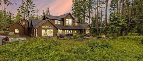 Luxurious home with majestic forest scenery