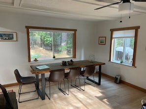 Dining table from refurbished lumber comfortably seats 8 and as many as 10.