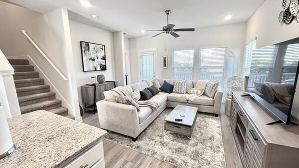 Enjoy the spacious living room setting, great for family time!!