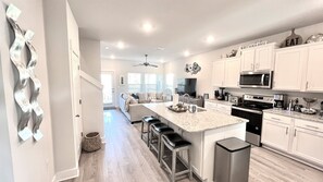 Spacious kitchen with large island to enjoy a quick meal!