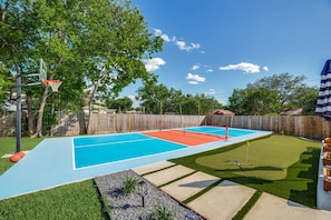 Full pickleball court and half basketball court plus a putting green!