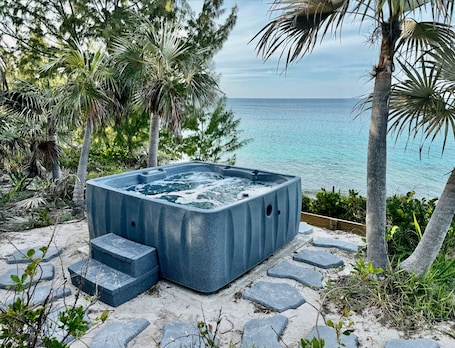 Our new ocean-view hot tub/spa, located above our beach!