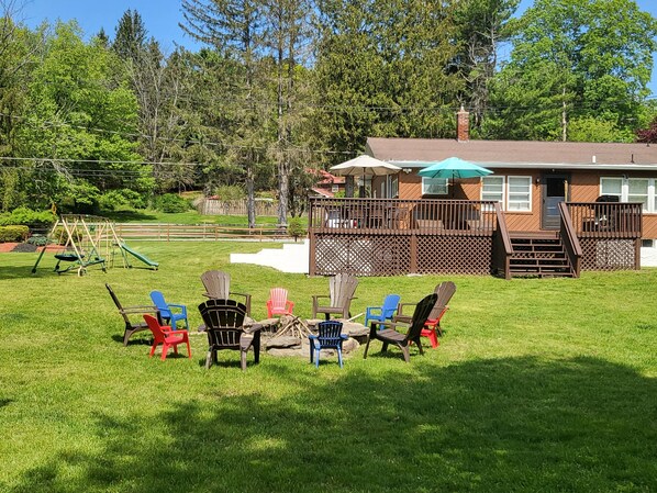 Adult & children fire pit chairs. Back angle view. 