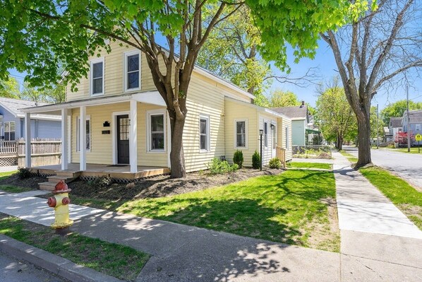 The house is so cute and... the fire hydrant matches the exterior color! 