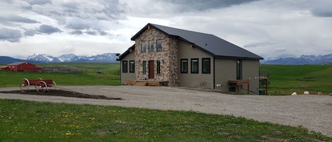 This newly built house sits on 18 acres of farm land.