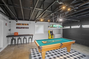 Game room featuring Billiard table, football table, arcade games console