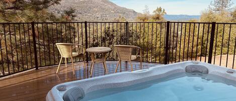 Enjoy our hot tub while looking at the gorgeous mountain views.