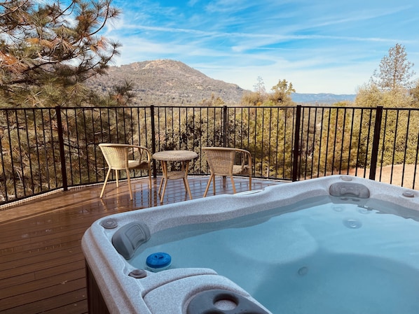 Enjoy our hot tub while looking at the gorgeous mountain views.