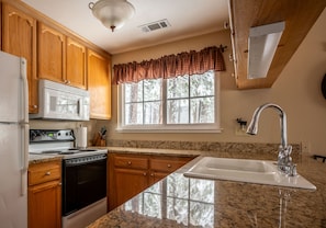 Plenty of counter space in kitchen.