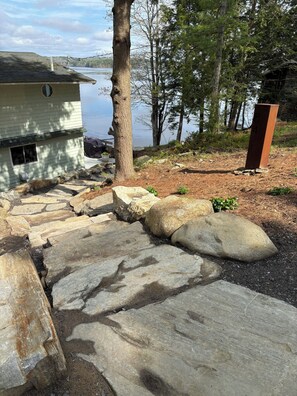 Take the stone staircase to the font door