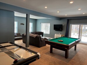 Huge rec room with pool table, air hockey and foosball