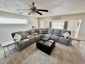 Comfortable reclining couch (Ottoman also has small seats inside) 