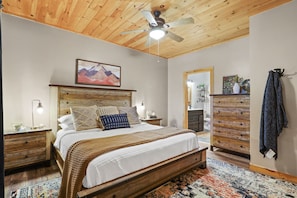 King size bed in master bedroom with room darkening curtains 😴