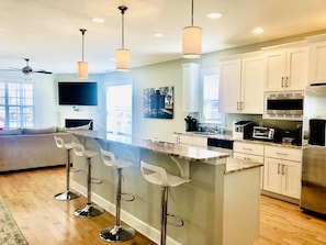 Light and airy open floor plan- living room and kitchen flow together