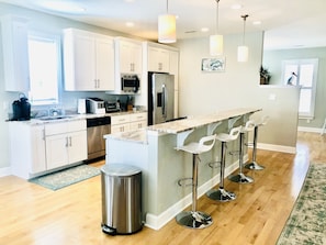 Large kitchen island perfect for gathering during mealtime