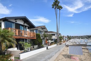 Walk on the boardwalk around Balboa Island