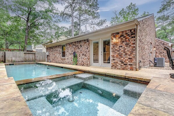 An outside oasis is located in your own backyard complete with a private pool, spacious hot tub, and outdoor dining table & seating! 
