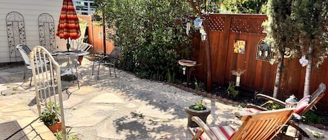 Lovely backyard seating to relax with a glass of wine in the afternoon.