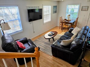 Living area with TV, couch, recliner