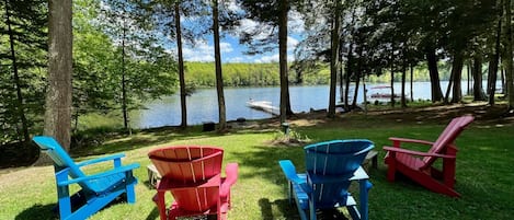 Gradual sloped yard overlooks 100ft of private waterfront.  