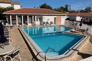 Heated swimming pool only steps from this unit.  Beach/pool towels provided