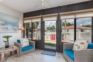 The sunroom has access to the pool & clubhouse areas.  Close the blinds for complete privacy if desired.