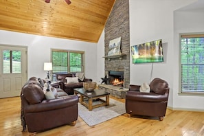 Leather seating by fireplace.  