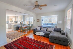Open Combination Living/Dining Room with Sun-room with trundle