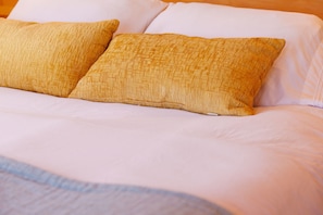 Our bed is the perfect place to rest and recharge during your stay.