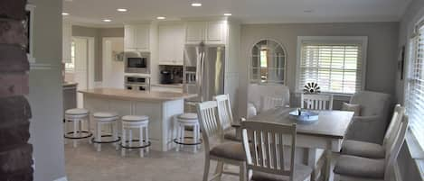 Beautiful kitchen/dining room is the hub of this home