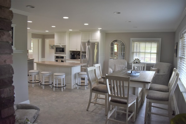 Beautiful kitchen/dining room is the hub of this home