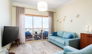 The large living room opens onto the large terrace.