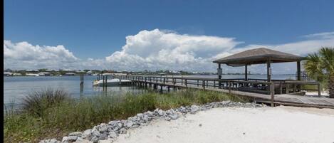 Community boat dock with gazebo and boat slips. Come tie up! 