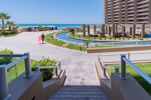 Private steps from the patio to the pool and beach