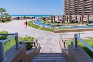 Private steps from the patio to the pool and beach