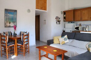 Living room and dining area of the apartment