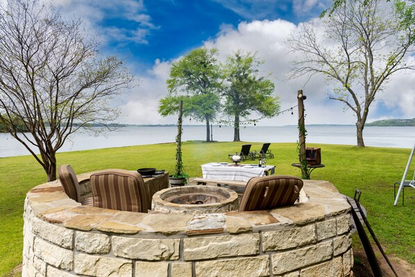 Water front firepit with panoramic views with picnic table. 