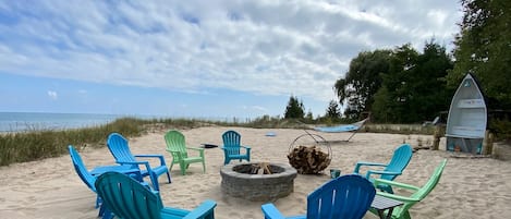 Firepit near the beach. Play cornhole or lay on the large hammock. 