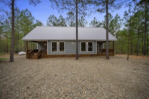 Front of the Cabin with a flat driveway - plenty of room for all vehicles.