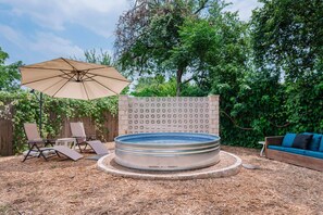 Enjoy the cowboy pool in this spacious yard