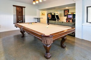 Pool table with ping pong top, 4 full size video games and a bar top game system