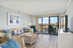 The Living Area is gorgeous with natural lighting and Ocean views.