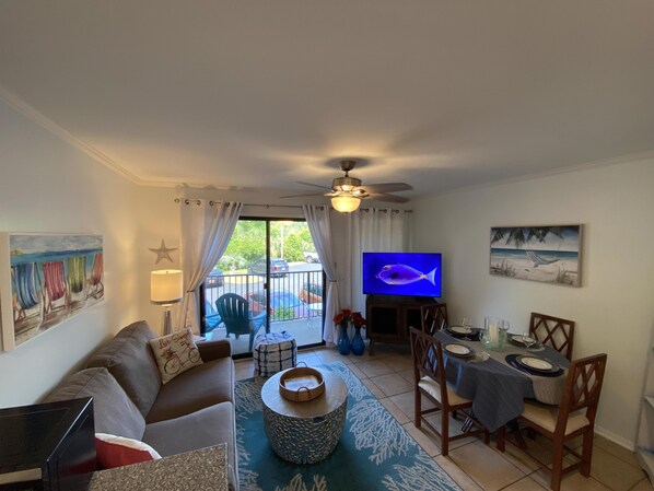 Enjoy streaming your favorite shows! The living room also includes a sleeper sofa