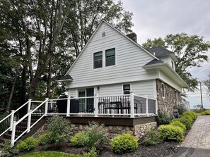 Large Outdoor Deck with Grill, Table and Chairs