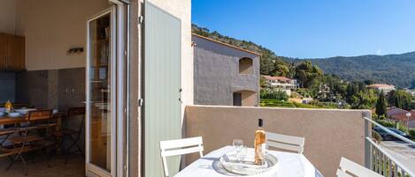 Sky, Furniture, Property, Building, Shade, Chair, Residential Area, Landscape, Plant, Roof