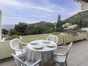 Sky, Table, Furniture, Property, Cloud, Chair, Plant, Azure, Interior Design, Outdoor Table