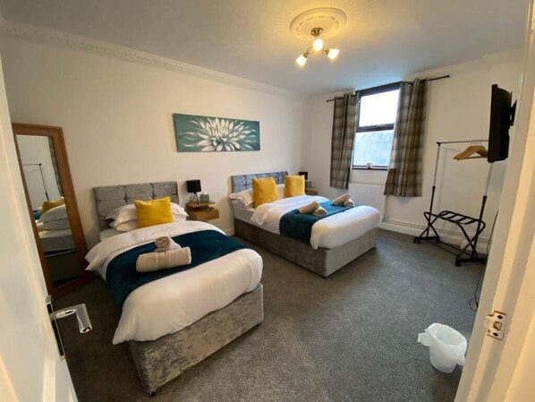 Perfect for unwinding, with comfortable beds and a peaceful vibe to make you feel right at home. A perfect space for a restful night and rejuvenating stay.