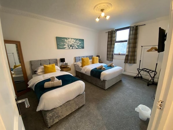 Perfect for unwinding, with comfortable beds and a peaceful vibe to make you feel right at home. A perfect space for a restful night and rejuvenating stay.