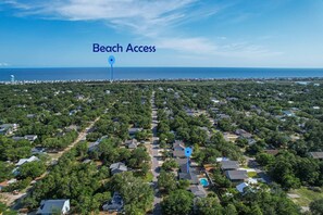 Aerial view of home looking South with beach access nearby