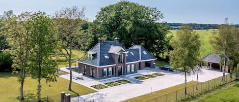 Drone photo of the house and its surroundings